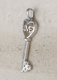 Sterling Silver Womens Round Diamond Love Key Pendant 1/10 Cttw